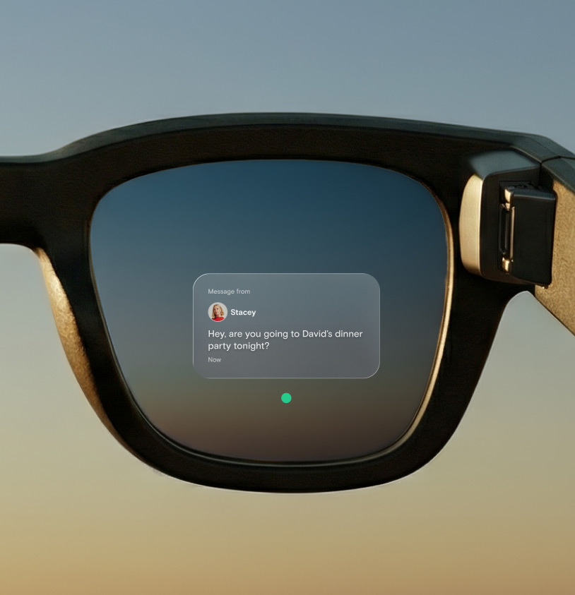 View through augmented reality glasses, showing message on lenses and sky beyond.